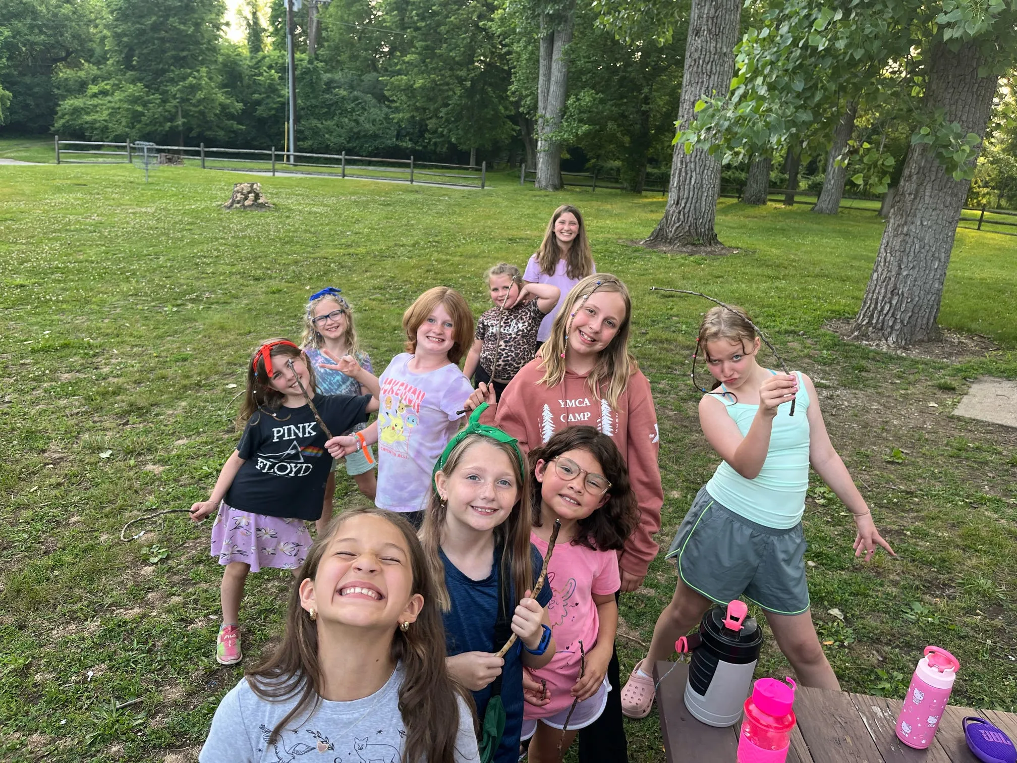 kids outside roasting s'mores